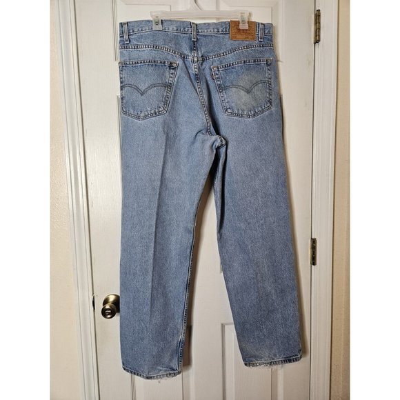 Levis Vintage 2002 550 Blue Jeans Mens 40x32 Tapered Leg Relaxed Fit Light Wash - Picture 2 of 12